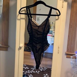Out from under bodysuit